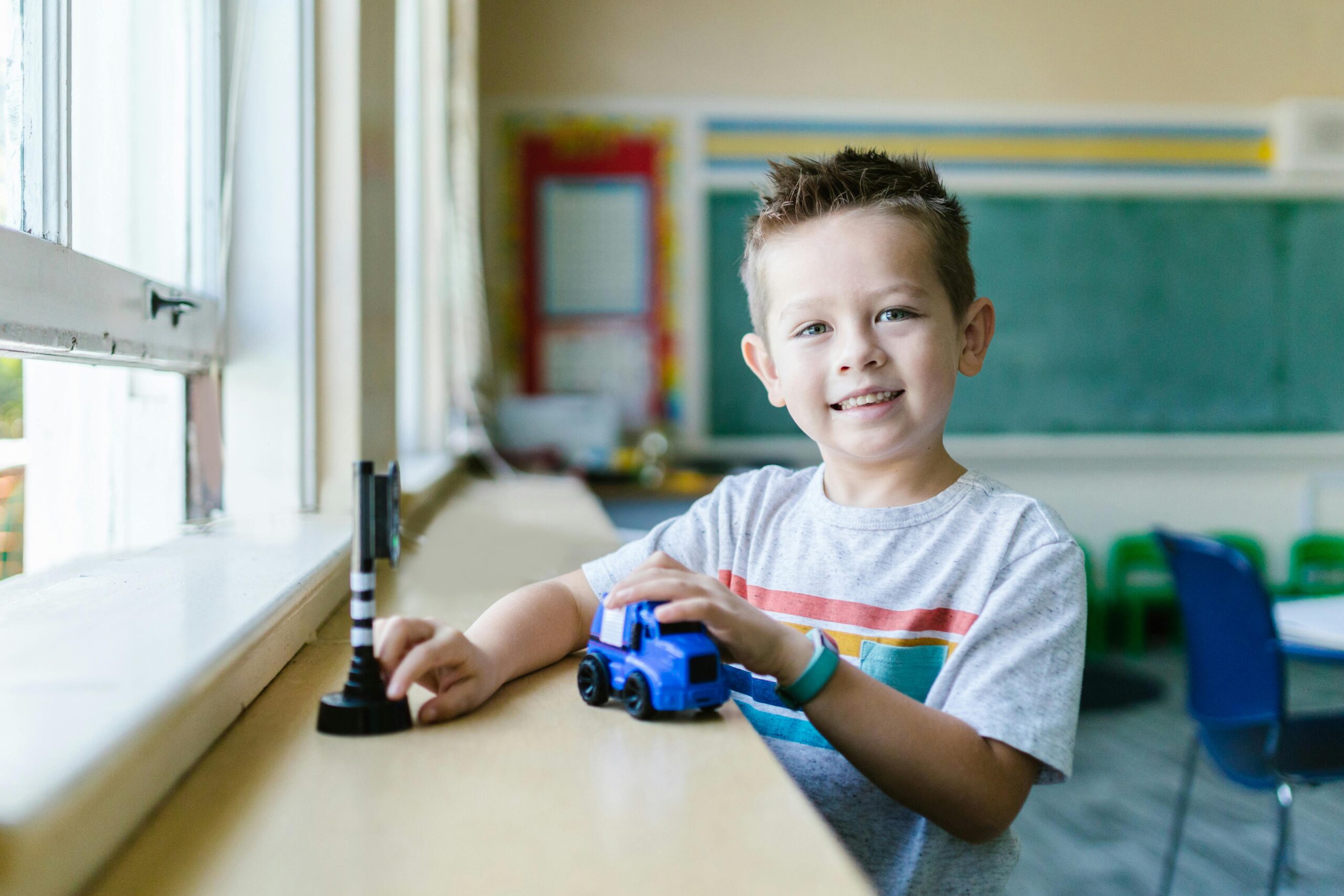 Smiling Kid in School